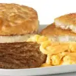 McDonald's Big Breakfast with scrambled eggs, sausage patty, golden hash browns, and a warm biscuit