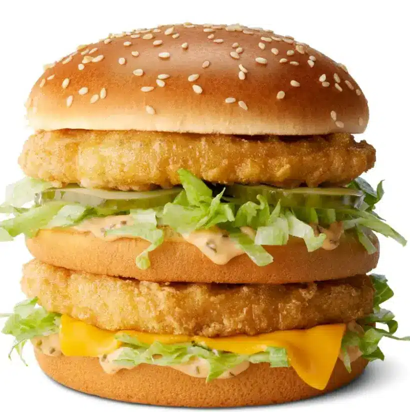 McDonald's Chicken Big Mac with two crispy chicken patties, lettuce, pickles, onions, cheese, and special Big Mac sauce in a sesame seed bun