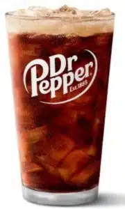 McDonald's Dr Pepper, a bold, flavorful soft drink served chilled over ice