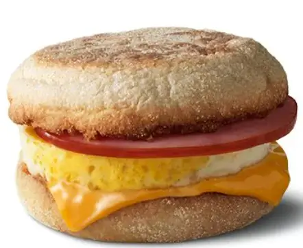 McDonald's Egg McMuffin with bacon, a soft English muffin, a fresh egg, melted cheese, and crispy bacon