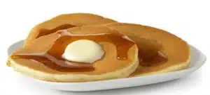 McDonald's Hotcakes with Real Butter, served with warm syrup and a side of creamy butter