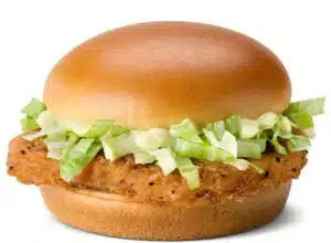 McDonald's McChicken sandwich with a crispy chicken patty, fresh lettuce, and creamy mayo in a soft sesame seed bun