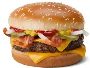 McDonald's Quarter Pounder with Cheese Bacon featuring a quarter-pound beef patty, cheese, crispy bacon, pickles, onions, and ketchup