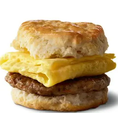 McDonald's Sausage Biscuit with Egg, featuring a savory sausage patty, fluffy scrambled egg, in a warm, flaky biscuit