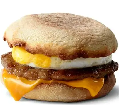 McDonald's Sausage McMuffin with Egg, featuring a sausage patty, scrambled egg, and melted cheese in a soft English muffin