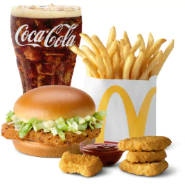 A McChicken® sandwich, a 4-piece Chicken McNuggets®, small World Famous Fries®, and a small Coca-Cola® neatly arranged on a tray.